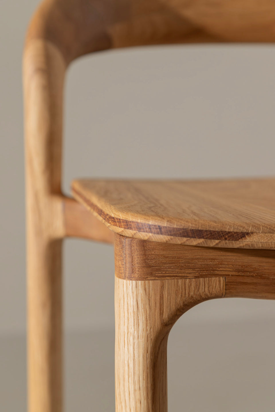 Formed wood, Italian linen, or Italian leather upholstered seat