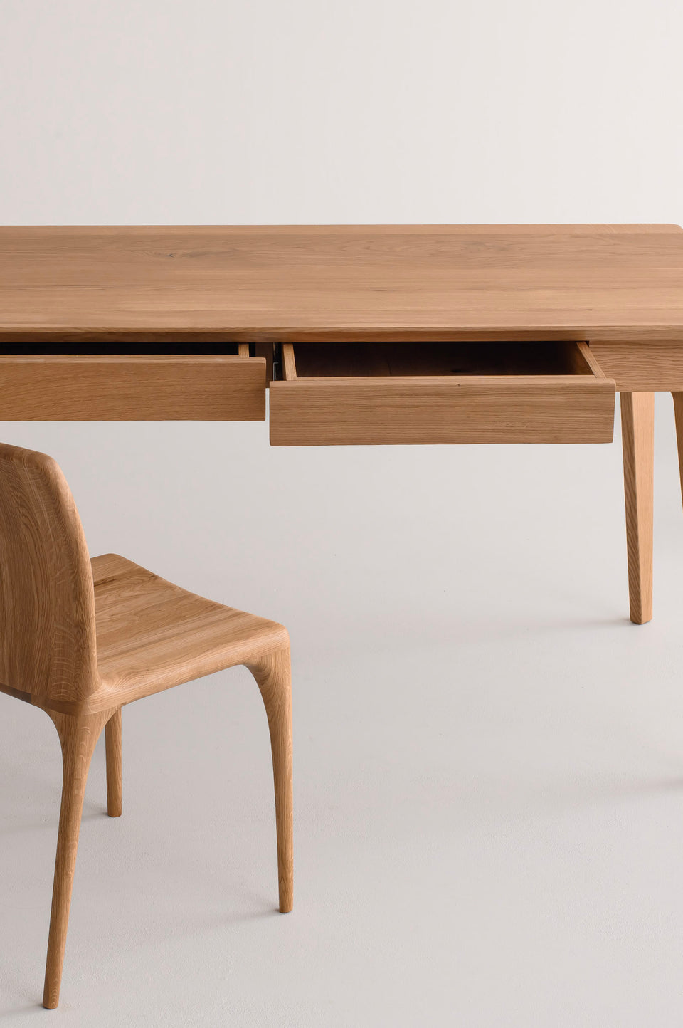 One drawer in the 47" version, two drawers in the 55" and 63" versions.