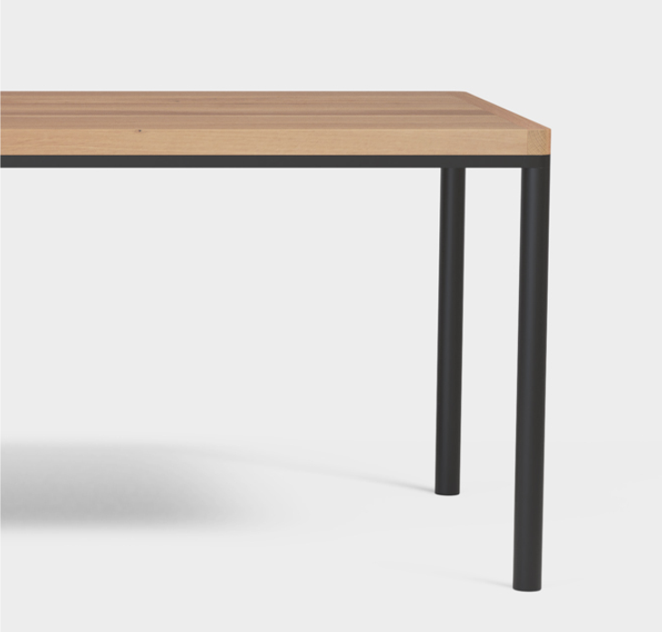 Steel legs meet solid wood for a clean, refined look.